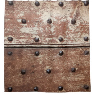 Detail of an old painted shabby door with rusty me
