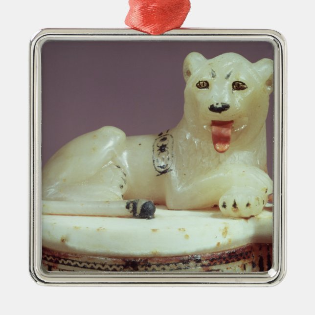 Detail of lid of an unguent jar with a figure metal ornament (Front)