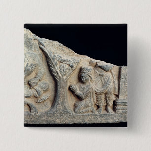 Detail of relief frieze depicting a seated 2 inch square button