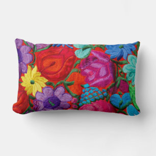 Detail of traditional embroidery floral textile lumbar pillow