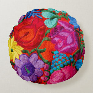 Detail of traditional embroidery floral textile round pillow
