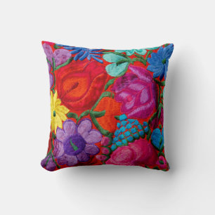 Detail of traditional embroidery floral textile throw pillow