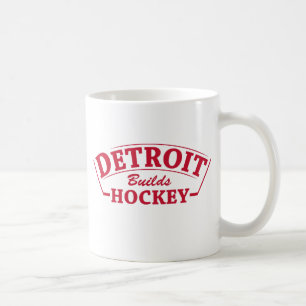 Detroit construit la tasse de blanc d'hockey