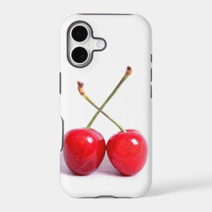 Deux cerises rouges sur fond blanc