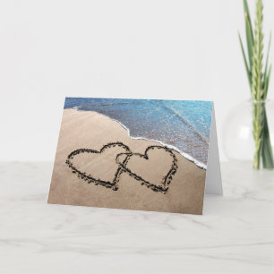 Deux Coeurs Dans La Carte De Salutation De Sable