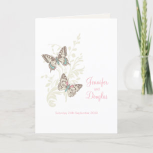 Deux papillons programmes de mariage blanc rose