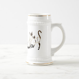 Deux tasses de chats siamois