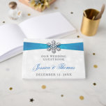 Diamante Snowflake & Blue Ribbon Winter Wedding Guest Book<br><div class="desc">Celebrate in style with this glamourous and very trendy real foil pressed wedding guestbook. The design is easy to personalize with your special event wording and your guests will be thrilled when they see this fabulous guestbook. Matching wedding items can be found in the collection.</div>
