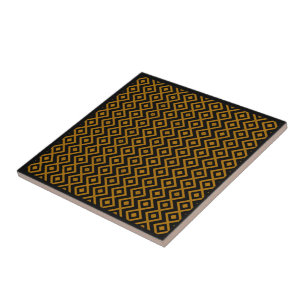 Diamond Shaped Harlequin Pattern Black And Orange Tile
