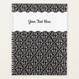 Diamond shaped White ornate Scrolls on black Planner