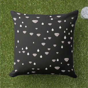 diamonds raindrops scattered on black outdoor pillow