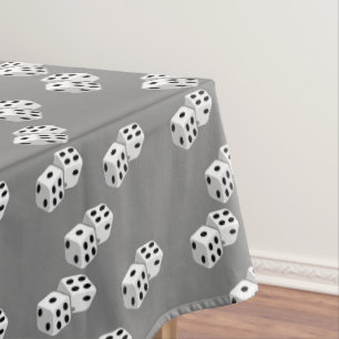 Dices on grey pattern tablecloth