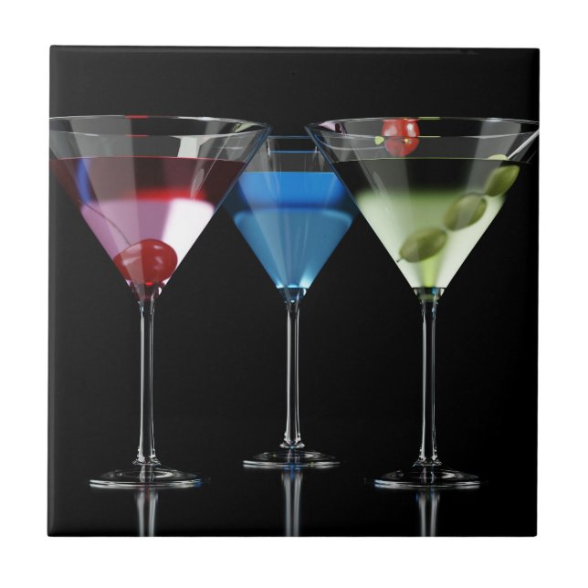 Different cocktails in martini glasses on black tile (Front)