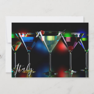 Different cocktails in martini glasses with lights