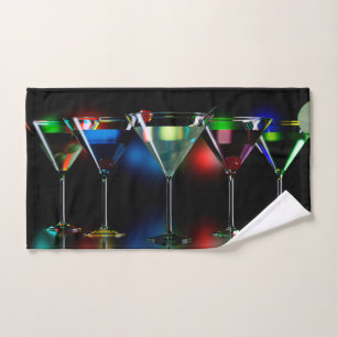 Different cocktails in martini glasses with lights bath towel set