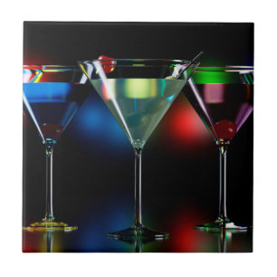 Different cocktails in martini glasses with lights tile