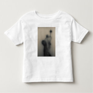 Diffused image of the Statue of Liberty Toddler T-shirt