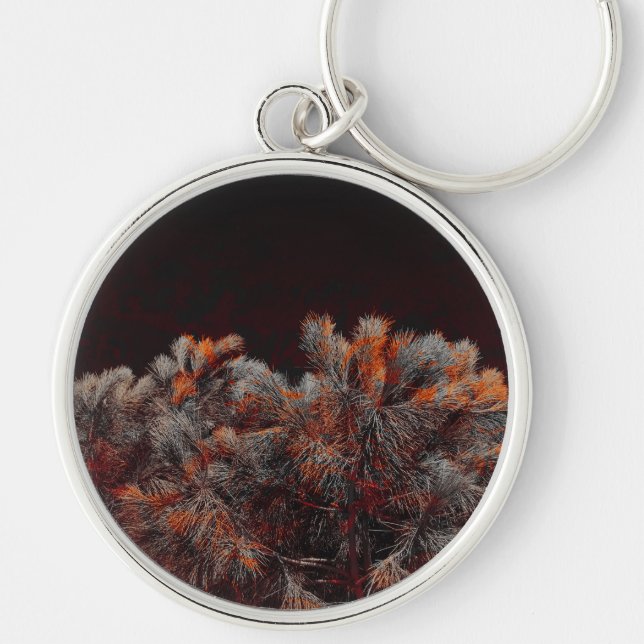 Digital art of pine tree with orange colour spots keychain (Front)