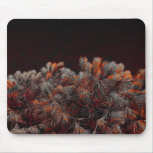 Digital art of pine tree with orange colour spots mouse pad