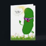 dill pickle with pink glasses for birthday card<br><div class="desc">Green dill pickle with bright pink eyeglasses standing in grass and flowers for getting older birthday</div>