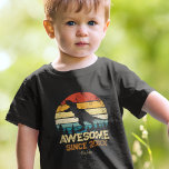 Dinosaur Birthday Boy Awesome Since Birth Year Toddler T-shirt<br><div class="desc">Does your little toddler boy or girl love dinosaurs? This custom shirt is perfect! There's a big T-Rex dino saying RAWR on top of a distressed rainbow background. All text is editable and currently says Awesome Since 2021 and the young kid's name. Substitute with your child's name and birth year...</div>