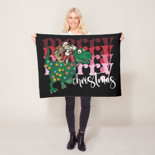 Dinosaur carrying Santa Claus Christmas Fleece Blanket