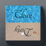 Dirty Clean Dishwasher Beach Water Plaque<br><div class="desc">This design was created though digital art. It may be personalized in the area provide or customizing by choosing the click to customize further option and changing the name, initials or words. You may also change the text colour and style or delete the text for an image only design. Contact...</div>