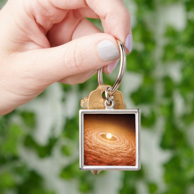 Disc Of Material Surrounding Star Fu Orionis. Keychain (Hand)