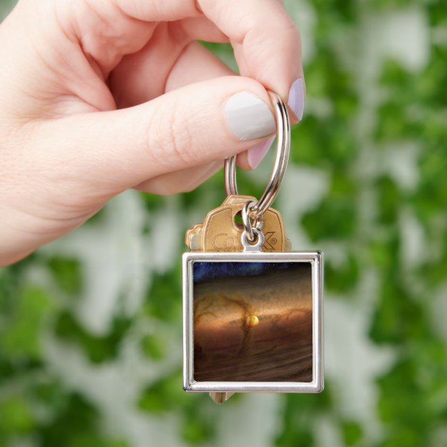 Discs Of Planet-Forming Material Circling Stars. Keychain (Hand)