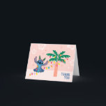 Disney's Stitch Birthday Thank You<br><div class="desc">Say thanks in the cutest way with this tropical Christmas birthday thank you card featuring Disney’s Stitch! The design shows Stitch wearing festive tree headbands and sitting beside a palm tree wrapped in colourful string lights. A soft pink background with hibiscus flowers and twinkling stars creates a warm, island-inspired look...</div>