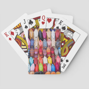 Displayed shoes in a shop in the souks playing cards