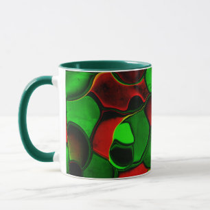 Distorted and strange shapes, red and green colour mug