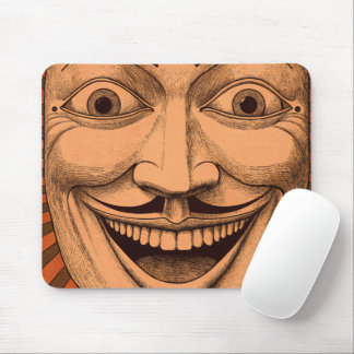 Disturbing Grinning Face Mouse Pad