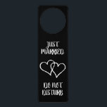 Do not disturb door hanger for just married couple<br><div class="desc">Just married door hanger | Do not disturb! Funny wedding gift idea for newly weds,  bride and groom or honeymoon couples. Two interlocking hearts design with elegant brush script typography. Marriage humour for husband and wife. Double love symbol. Black and white colours.</div>