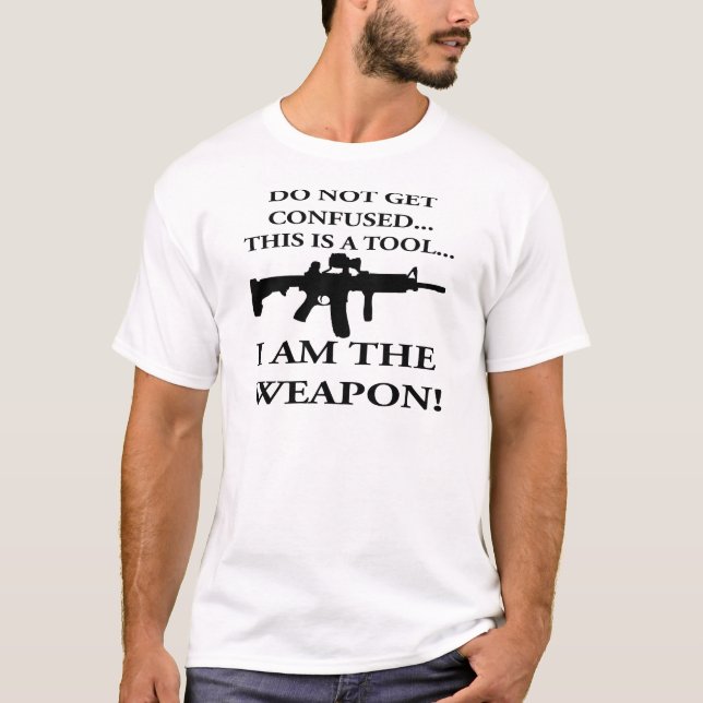 Do Not Get Confused This Rifle Is A Tool I Am The T-Shirt (Front)