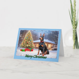 Doberman avec une carte de Noël Arbre