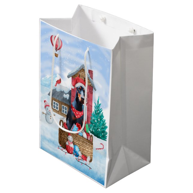 Doberman Dog In snow Christmas Dog House Medium Gift Bag (Front Angled)