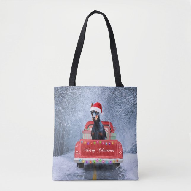 Doberman Dog in Snow sitting in Christmas Truck Tote Bag (Front)