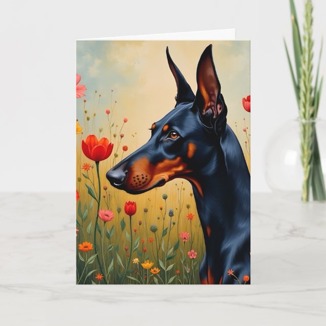 Doberman in a field of flowers  card (Front)