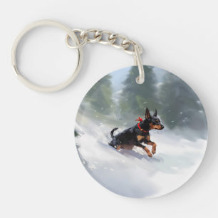 Doberman Pinscher neige de Noël hiver