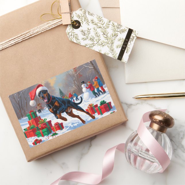 Doberman Running in Snow with Christmas Hat Sticker (Gifting)