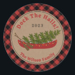 Dock The Halls Canoe Christmas Tree Plaid Classic Round Sticker<br><div class="desc">Illustration of a red canoe decorated with Christmas lights with Christmas tree inside.  Background is brown cardstock with red and black buffalo plaid border.  Personalize the text.</div>