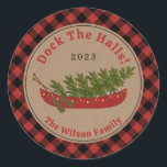 Dock The Halls Canoe Christmas Tree Plaid Classic Round Sticker<br><div class="desc">Illustration of a red canoe decorated with Christmas lights with Christmas tree inside.  Background is brown cardstock with red and black buffalo plaid border.  Personalize the text.</div>
