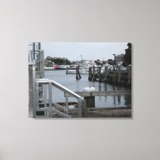 Docks Overlooking a Clam Sea Canvas Print