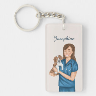 Docteur vétérinaire tenant un chiot Nom personnali