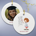Doctor Optometrist Girl Christmas Photo Ceramic Ornament<br><div class="desc">Cute Christmas photo ornament with a girl working on an eye exam on one side and a photo on the other. Perfect for medical doctors and nurse graduates. Personalize the text with your own message. Illustrated and designed by Patricia Alvarez.</div>