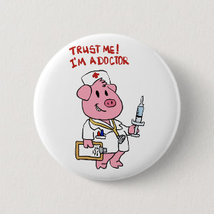 Doctor pig with syringe in hand   choose back colo 2 inch round button
