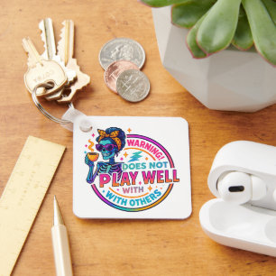 Does Not Play Well....  Keychain