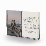 DOES THIS RING Make Me Look Engaged Calligraphy Photo Block<br><div class="desc">Does this ring make me look engaged calligraphy acrylic photo block - A cute blush background displaying your engagement photo on the left, and a modern luxury calligraphy design featuring a gold diamond engagement ring quoting: "Does this ring make me look engaged?" Personalized below with the married name of the...</div>