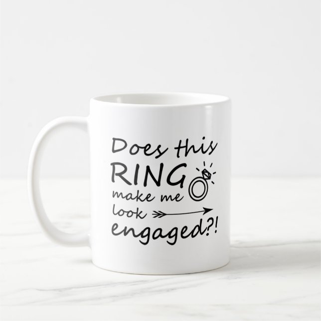 Does this ring make me look engaged? coffee mug (Left)